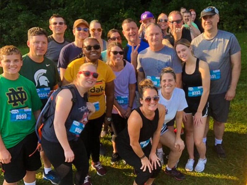 TelNet Worldwide Staff posing at Inflatable 5k